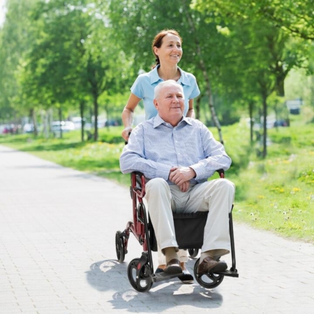 Rollator walker with padded seat