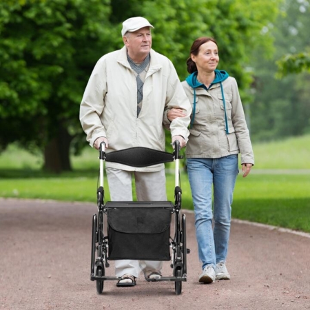 Rollator walker with padded seat