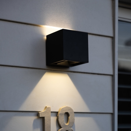Add adjustable warm white illumination to an outdoor wall