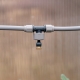 Direct a fine cooling mist exactly where it is needed with the Hoselink Misting System In-line Directional Head. The adjustable head installs along a compatible misting hose and can be aimed toward an outdoor seating area