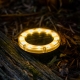 Add low-profile warm white lighting to paths