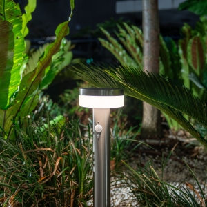 Improve pathway and garden visibility with the LUMINOUS Stainless Steel Solar Bollard. The contemporary metal post uses solar energy and a motion sensor to provide additional light when movement is detected after dark. It installs without mains wiring and suits paths
