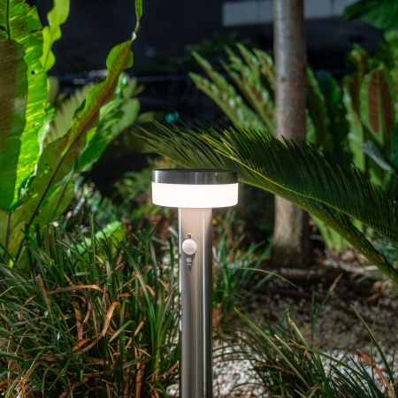Improve pathway and garden visibility with the LUMINOUS Stainless Steel Solar Bollard. The contemporary metal post uses solar energy and a motion sensor to provide additional light when movement is detected after dark. It installs without mains wiring and suits paths