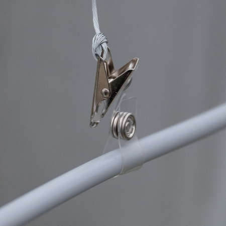 Hold Hoselink misting hose securely against a suitable mounting surface with the Misting System Installation Clip. The clip helps create a neat