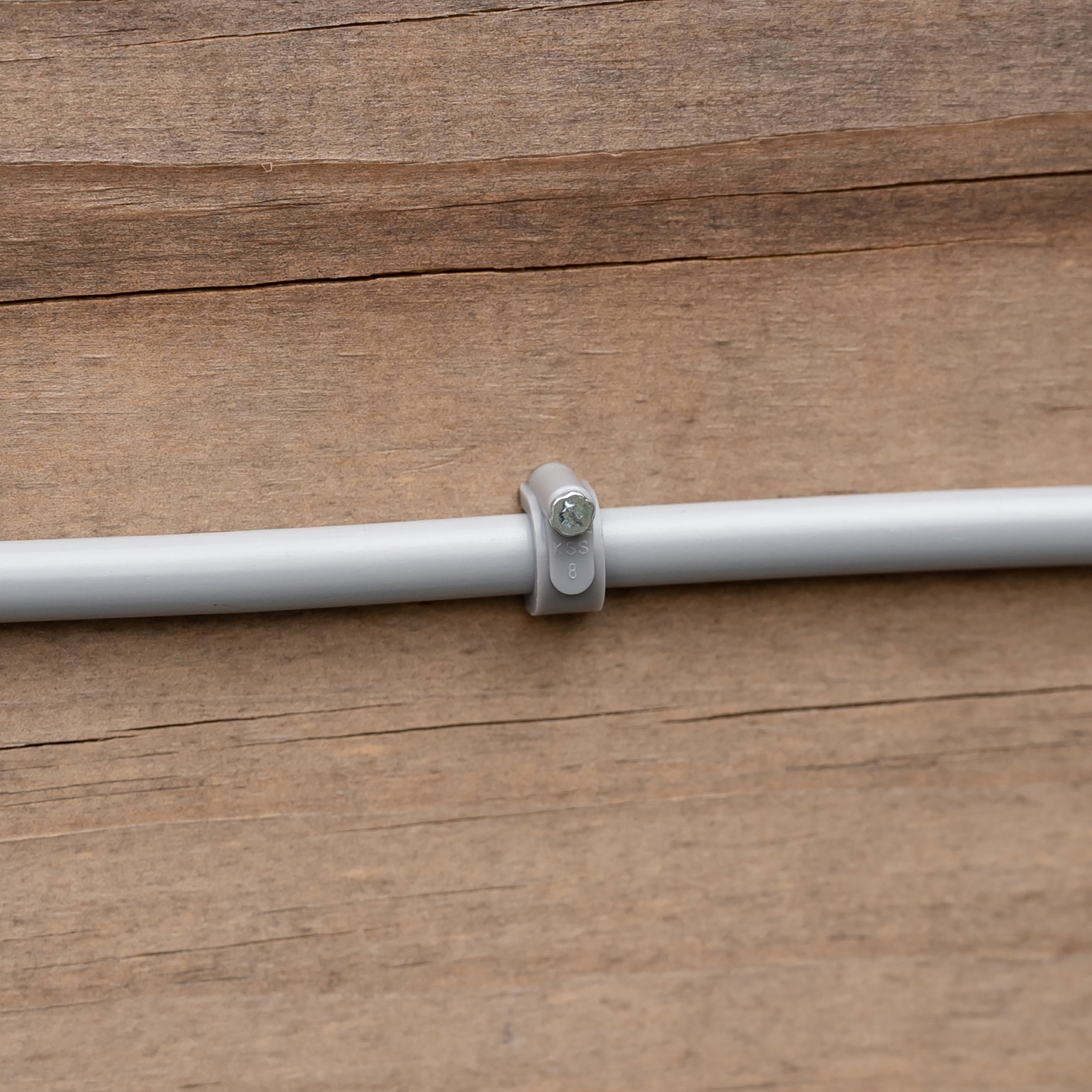 Secure Hoselink misting tube neatly along timber