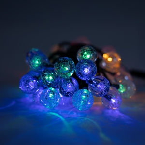 Add colourful decorative lighting to trees