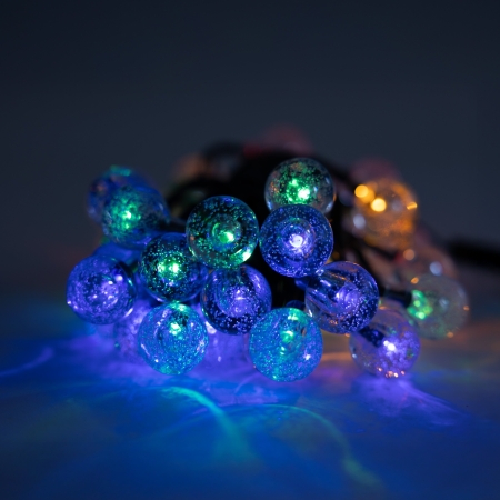 Add colourful decorative lighting to trees