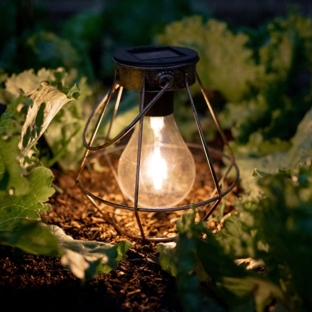 Create warm decorative ambience with the RUSTICA Industrial Style Solar Lantern. The geometric frame surrounds a filament-style two-LED globe