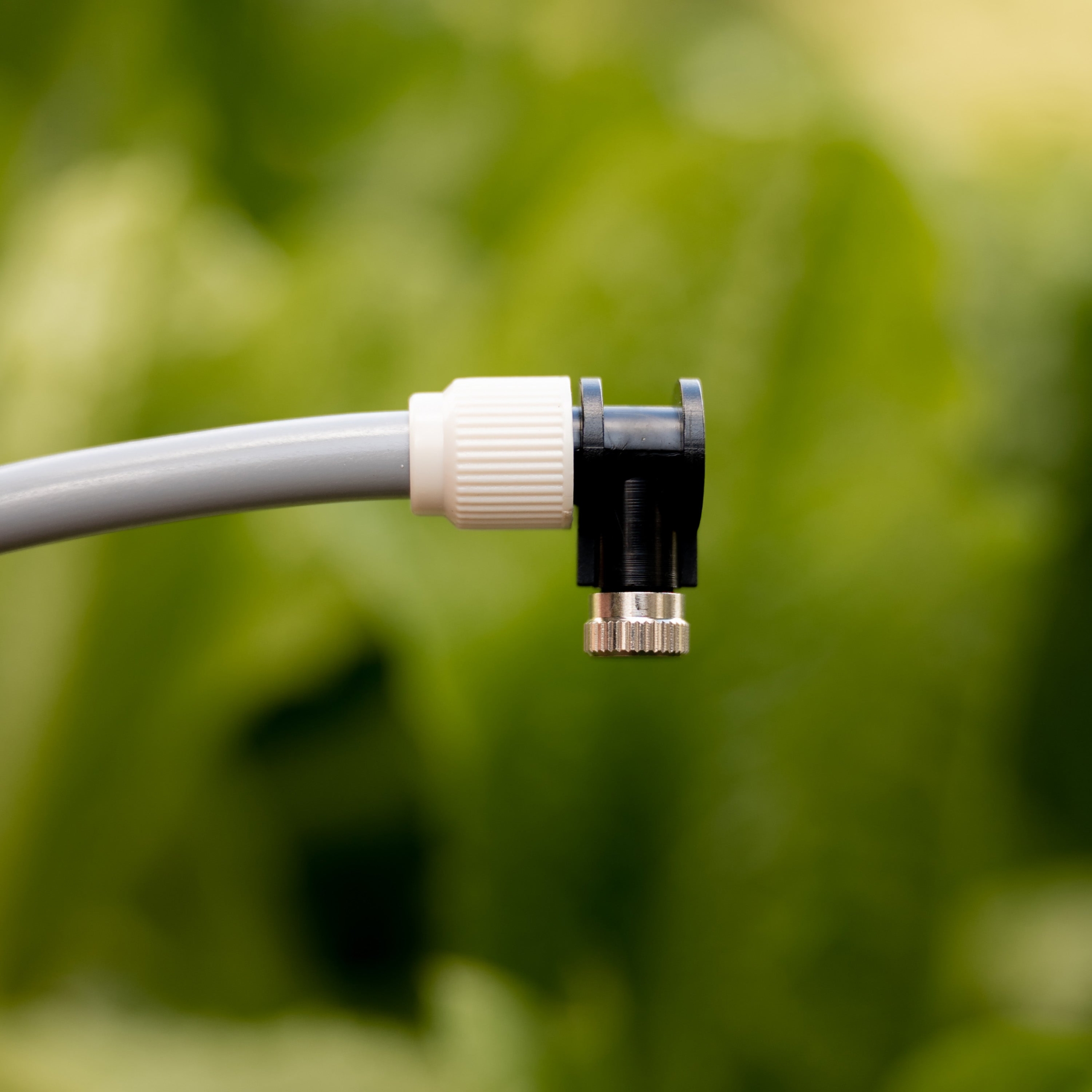 Finish a Hoselink misting line with the Misting System Stop Mist Valve. This end fitting closes the final section of tubing while incorporating a misting outlet