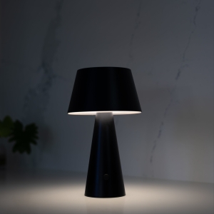 Add portable cool-white lighting to indoor or outdoor tables with the OBLIQUE Solar Table Lamp. The adjustable head allows the light direction to be changed for dining