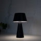Add portable cool-white lighting to indoor or outdoor tables with the OBLIQUE Solar Table Lamp. The adjustable head allows the light direction to be changed for dining